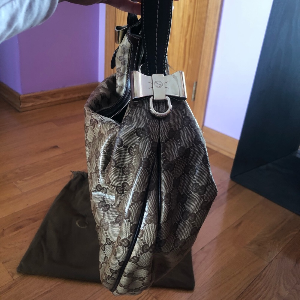 Gucci monogram GG shoulder bag with bow accents